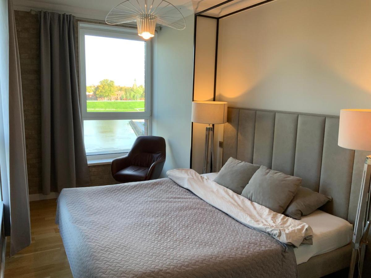 Riverside Apartment Self Check-In ไคลเพดา ภายนอก รูปภาพ